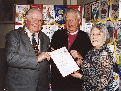 The Mayor of Durham, Coun Michael Rochford and the Bishop of Durham, Dr David Jenkins, congratulate Joan Slack, winner of the 1993 Rotary Clubs Vocational Award.